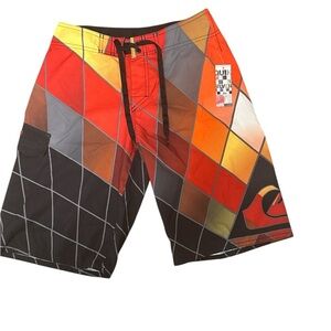 Quiksilver Red and Black Board Shorts with Geometric Design Size 26 Swim Surf
